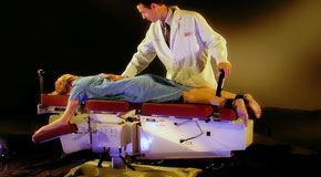 This is a picture of Cox Technic chiropratic spinal manipulation as performed at Johnson Chiropractic.